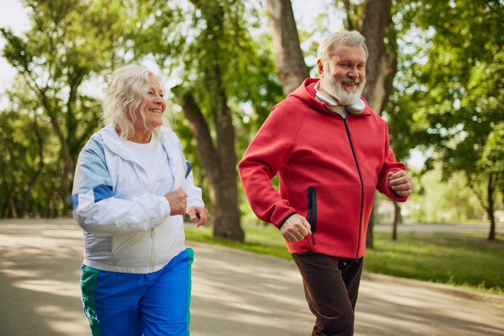 Man and woman in the sixties running