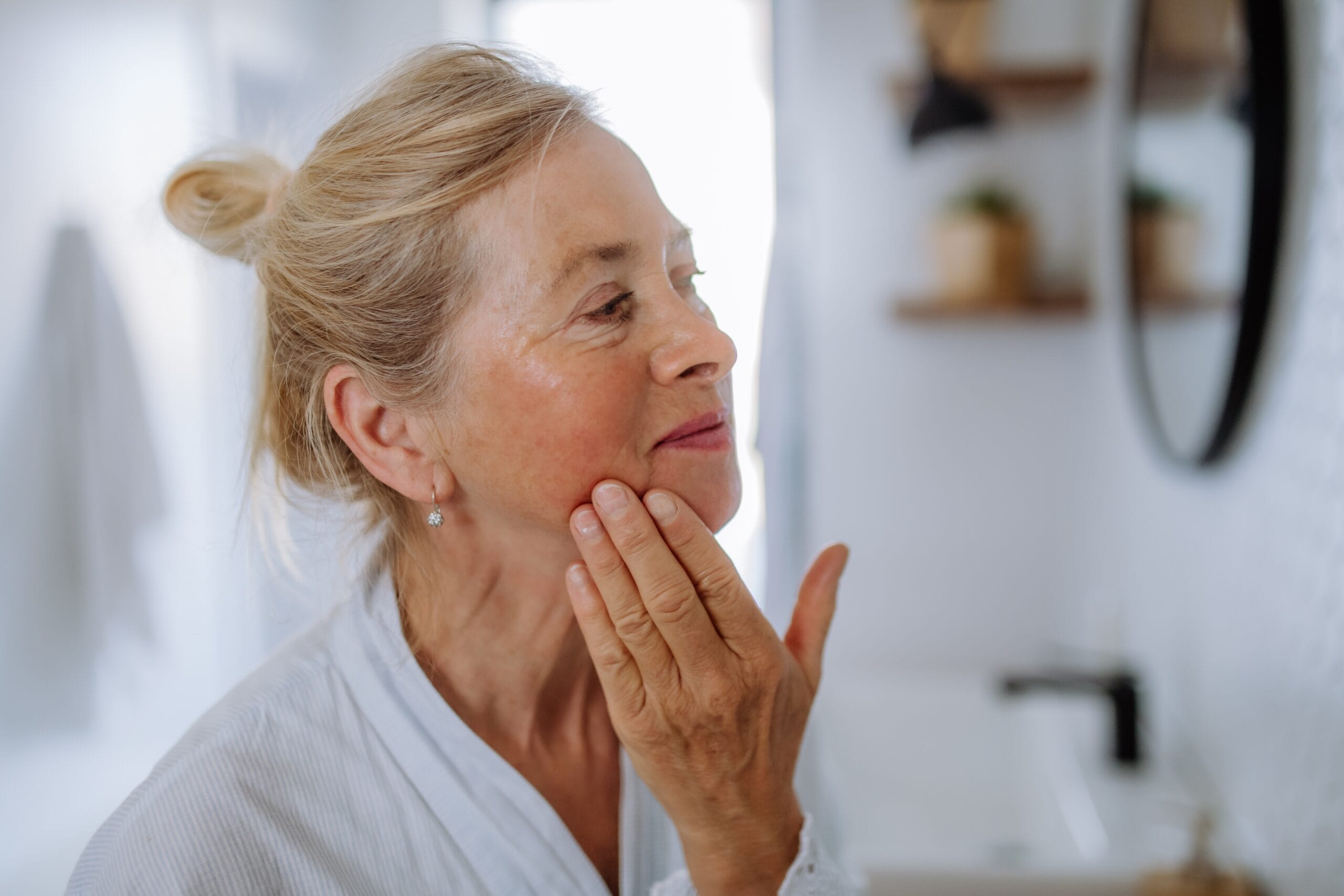Woman applying cream