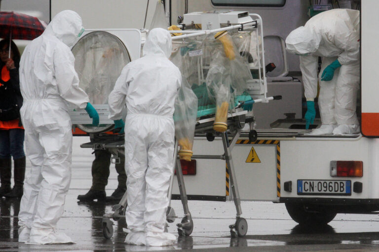 American doctor infected with Ebola as authorities tighten health controls